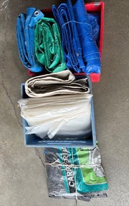 lot 114 image: Lot of Blue and Green Tarps, Canvas Drop Cloths, Plastic Sheeting and Large Carrier Bag