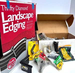 lot 310 image: Thrifty Diamond Landscape Edging Kit with Stakes, Connectors, and Fabric Pegs
