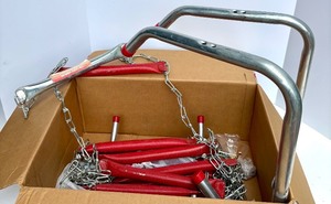 lot 312 image: Heavy Duty Tire Chains with Red Climbers and Metal Hooks