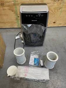lot 12 image: Honeywell 14,000 BTU Heat and Cool Portable Air Conditioner with Heating Pump - Black and Silver, MN4HFS9