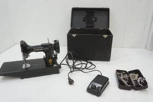 lot 132 image: Vintage singer sewing machine
