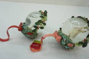lot 173 image: Department 56 Patience Brewster Snow Globe Stocking Holders 2ct