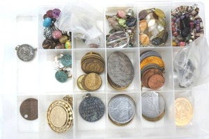 lot 342 image: Organizer with various tokens, metals, and other jewelry