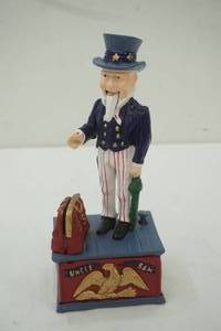 lot 390 image: Uncle Sam Cast Iron Bank 10.5 tall