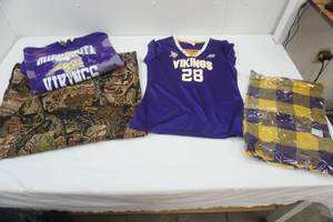 lot 393 image: Vikings Shirts & Camo Material