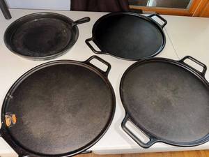 lot 8 image: Lot of 4 Lodge Cast Iron Skillets and Griddles Various Sizes