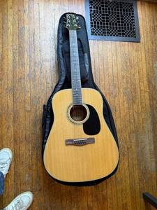 lot 13 image: Mitchell MD100 Acoustic Guitar with Fender Gig Bag