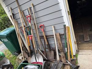 lot 20 image: Collection of Garden and Yard Tools including Shovels, Rakes, and Hoes