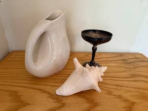 lot 51 image: Decorative Lot Oneida Stoneware Pitcher, Silver-Plated Goblet, and Conch Shell
