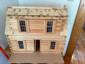 lot 59 image: Wooden Log Cabin Dollhouse with My Family Dolls and Accessories