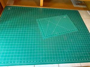 lot 174 image: Lot of 2 Cutting Mats Including 36x24 Inch and 18x12 Inch