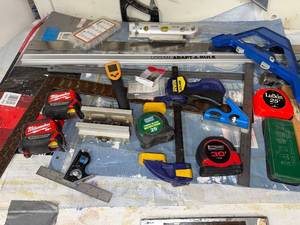 lot 279 image: Collection of Measuring Tools, Clamps, and Hand Tools Including Tape Measures and Squares