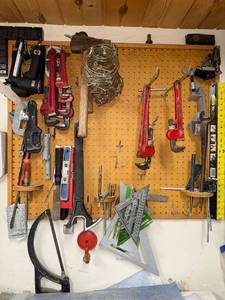 lot 280 image: Workshop Hand Tool Collection with Levels, Pipe Wrenches, and Squares