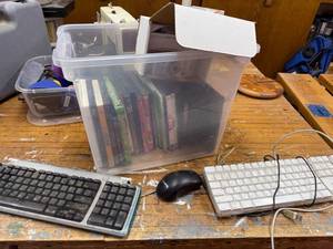 lot 289 image: Electronics Lot with Nikon Coolpix Camera, 2 USB Keyboards, and Mixed DVD Collection