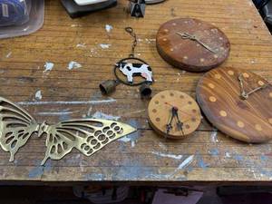 lot 290 image: Assorted Wall Decor Lot with Wood Clocks and Brass Butterfly