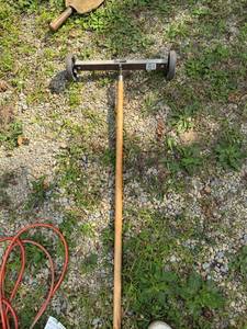 lot 333 image: Handheld Rolling Magnetic Pickup Tool with Wheels
