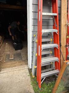 lot 345 image: Keller Fiberglass Step Ladder and Cosco Worlds Greatest Multi-Position Ladder