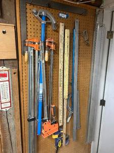 lot 201 image: Clamp and Measuring Tool Lot with Bar Clamps, Squares, and Levels