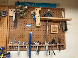lot 204 image: Assorted Hand Tools and Wrenches Hanging on Pegboard