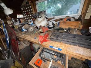 lot 312 image: Workbench Lot with Bench Vise, Grinder, Hardware, and Tools