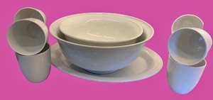 lot 57 image: White Porcelain Dinnerware Set Including Bowls, Cups, and Serving Platter