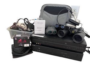 lot 93 image: Electronics and Binoculars Lot with Sony VCR, Samsung DVD, Headphones, Team Pride Car Light