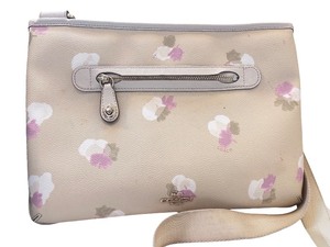 lot 105 image: Coach Floral Crossbody Bag with Pink and Purple Accent