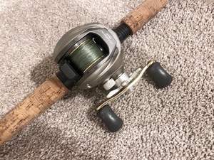 lot 216 image: Abu Garcia Black Max Baitcasting Rod and Reel Combo