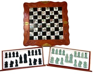 lot 222 image: Carved Wood Chess and Checkers Set with Asian Motif Pieces and Inlaid Board