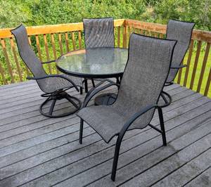 lot 122 image: Glass Topped Patio Table Set