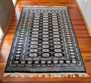 lot 53 image: Dark Blue and White Bokhara Wool Accent Rug