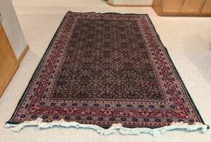 lot 18 image: Lovely Red Persian Wool Area Rug