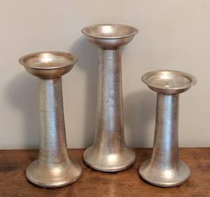 lot 29 image: Trio of Decorative Silver Pilar Candleholders