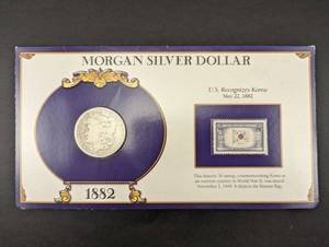 lot 17 image: 1882 Morgan Silver Dollar with Commemorative Stamp