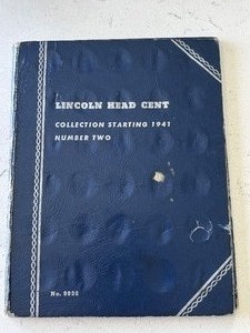 lot 32 image: Lincoln Cents and Book