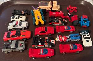 lot 70P image: Collection of 19 Robotic Transforming Toy Cars and Vehicles - Mixed Condition