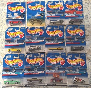 lot 145P image: Lot of 12 Hot Wheels Die-Cast Cars (Enforcer, Tripodic Series, 1996 First Editions)