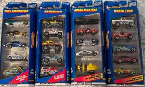 lot 180P image: Lot of 4 Hot Wheels 5-Car Sets in Original Packaging 50s Cruisers, Off-Road 4x4s, Ocean Blasters, World Tour