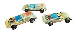 lot 107 image: Set of 3 Vintage Red Line Hot Wheels The Gold One Diecast Cars