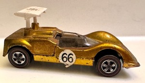 lot 139 image: Vintage Hot Wheels Chaparral 2G Metallic Yellow Redline Diecast Car (1968)