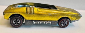 lot 142 image: Vintage Hot Wheels Redline Whip Creamer Metallic Yellow Diecast Car (1969)