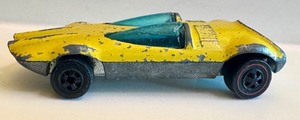 lot 143 image: 1969 Hot Wheels Redlines Swingin Wing Diecast Car Yellow