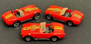lot 170 image: Set of 3 Vintage Hot Wheels 1982 Cobra Cars with Red and Yellow Stripes