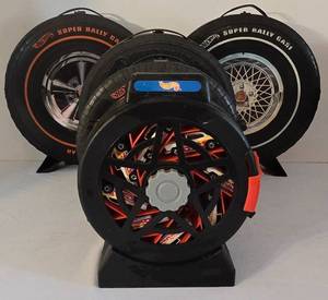 lot 68K image: LR - Set of 5 Hot Wheels Tire-Shaped Carrying Cases and Revolving Car Dispenser