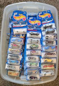 lot 74K image: LR - Collection of 50 Factory-Sealed Hot Wheels Cars in Original Packaging