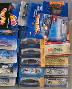 lot 87K image: LR - Collection of Over 50 Sealed Hot Wheels Vehicles Assorted Models