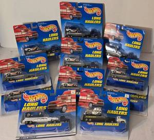 lot 88K image: LR - Lot of 11 Hot Wheels Long Haulers Die Cast Trucks, 9 Identical