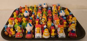 lot 143K image: K - Collection of Sesame Street Character Toy Vehicles 3 Inch Figures