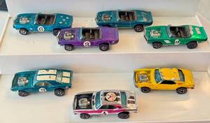 lot 192 image: Lot of 7 Vintage Hot Wheels Redlines Light My Firebird and Heavy Chevy Cars