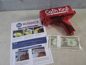lot 105 image: (EC1) Working Money Gun - Shoots Do...